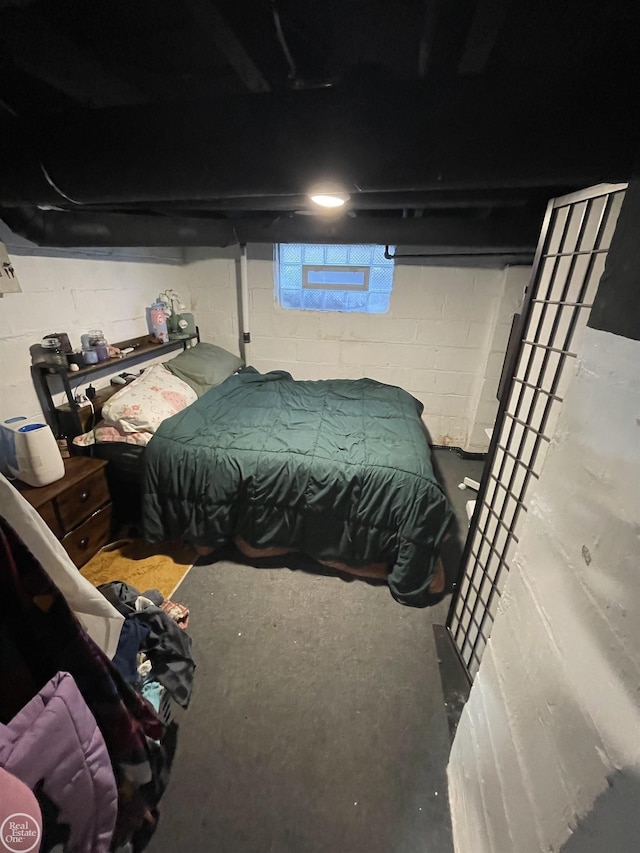 bedroom with concrete flooring