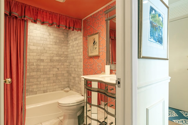 bathroom featuring vanity, wallpapered walls, tub / shower combination, tile patterned flooring, and toilet