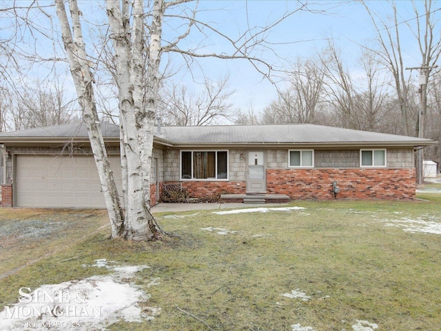 single story home featuring brick siding, an attached garage, driveway, and a front lawn