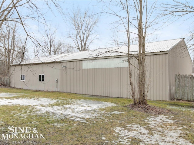 view of yard with an outbuilding and a pole building