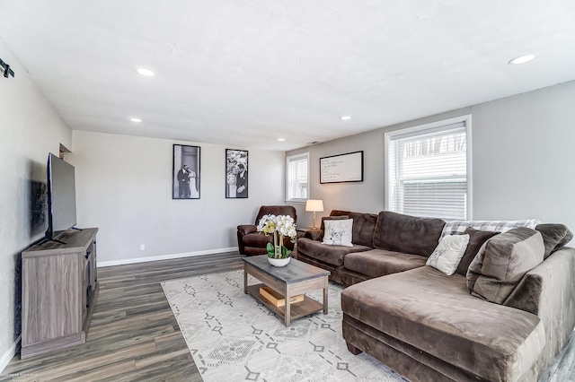 living room with recessed lighting, wood finished floors, and baseboards