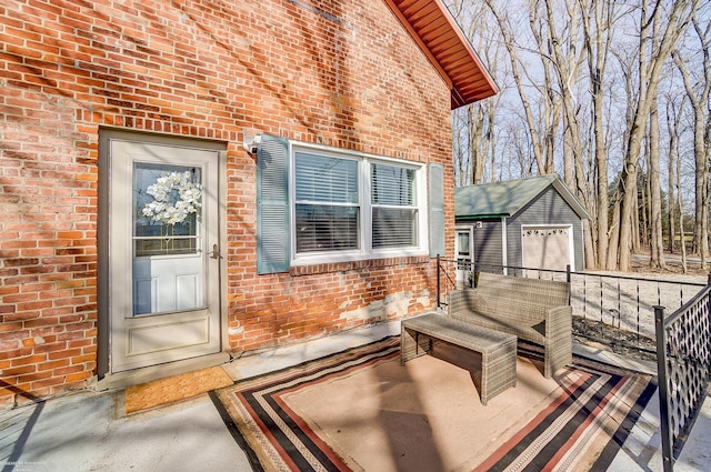 doorway to property with brick siding