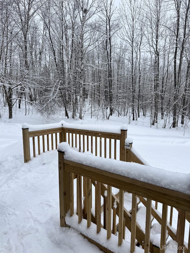 view of snow covered deck