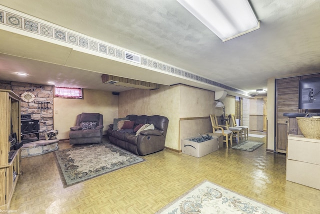 living area with visible vents and parquet flooring