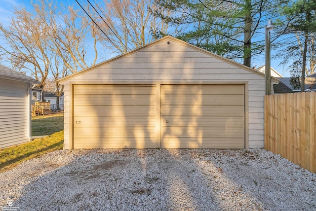 detached garage with fence