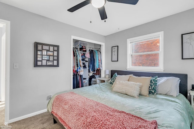 bedroom with a closet, carpet flooring, a ceiling fan, and baseboards