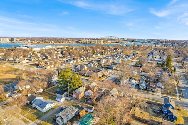 birds eye view of property featuring a residential view and a water view