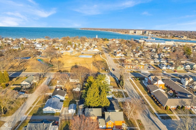 aerial view featuring a water view and a residential view