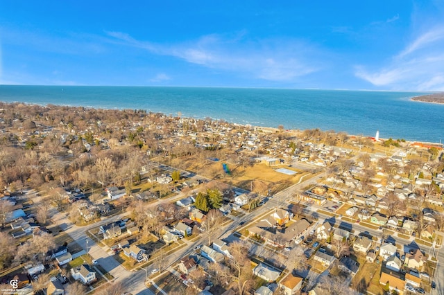 bird's eye view with a residential view and a water view