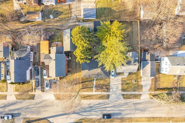 birds eye view of property with a residential view