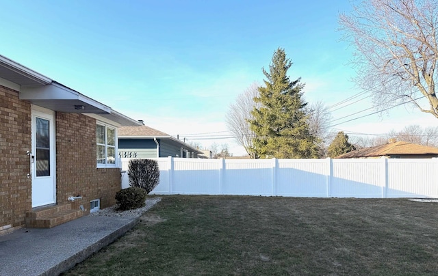 view of yard with fence