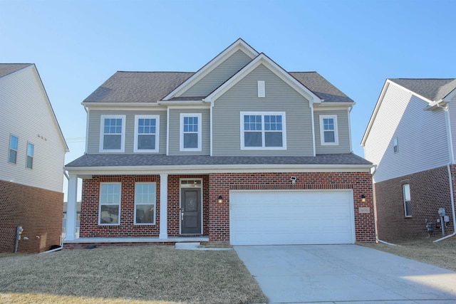 view of front of property with concrete driveway, a garage, covered porch, and brick siding