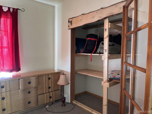 bedroom featuring baseboards