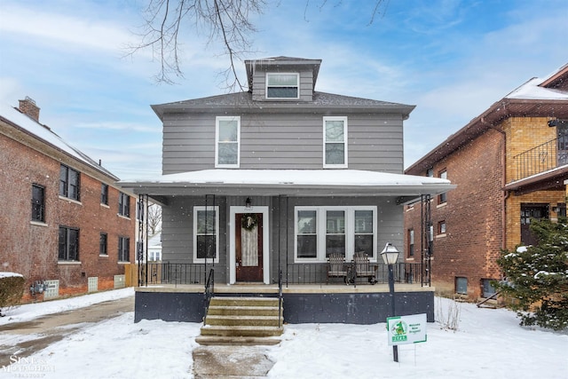 traditional style home with covered porch