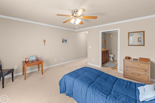 bedroom featuring baseboards, ceiling fan, ensuite bathroom, crown molding, and light colored carpet