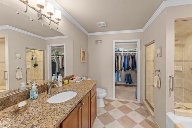 full bathroom with visible vents, a walk in closet, a stall shower, and crown molding