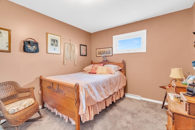 bedroom with light carpet and baseboards