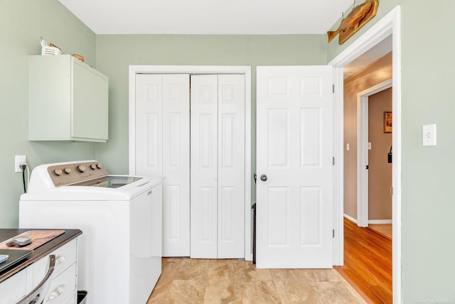 laundry area featuring cabinet space and independent washer and dryer