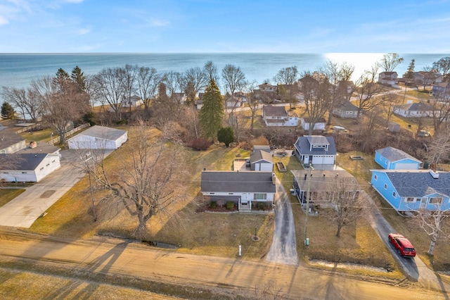 bird's eye view featuring a residential view and a water view