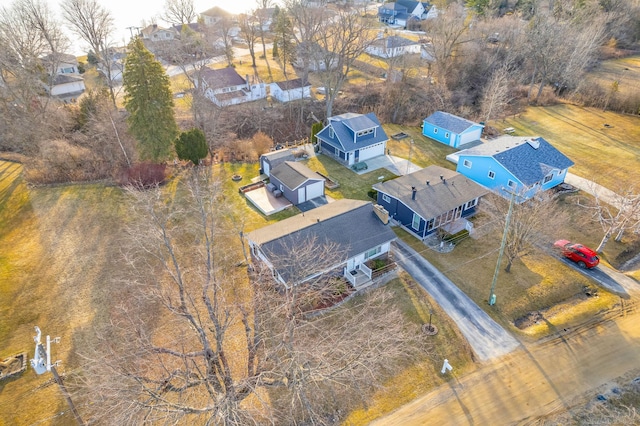 birds eye view of property with a residential view