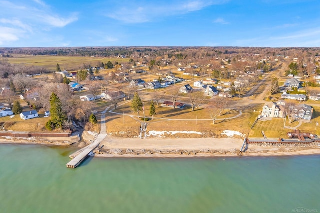 aerial view with a residential view and a water view