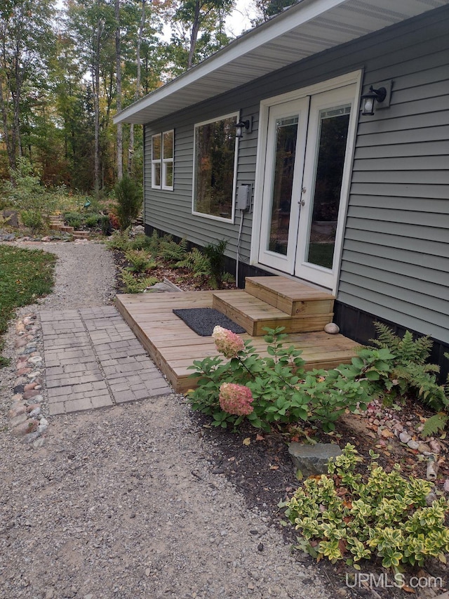 exterior space with french doors and entry steps