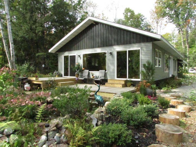 rear view of property with a deck