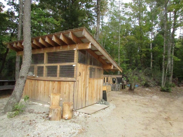 view of outbuilding featuring an outbuilding and an exterior structure