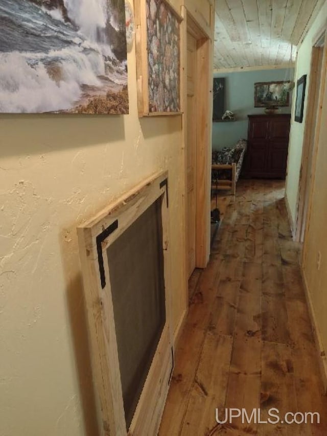 corridor featuring wooden ceiling and hardwood / wood-style flooring