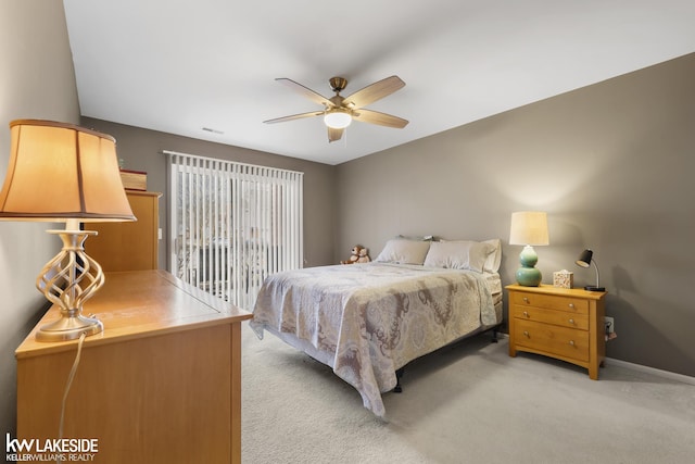 bedroom with visible vents, baseboards, ceiling fan, light colored carpet, and access to outside