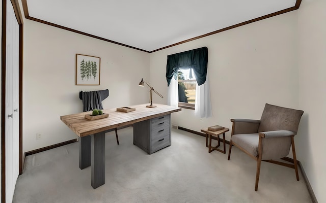 home office featuring light colored carpet, baseboards, and ornamental molding