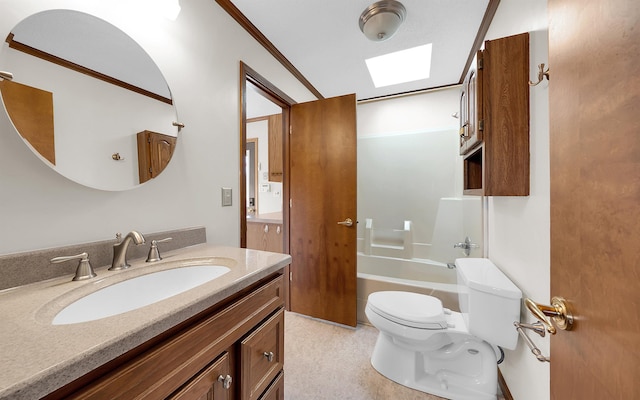 full bathroom featuring crown molding, toilet, a skylight, bathtub / shower combination, and vanity