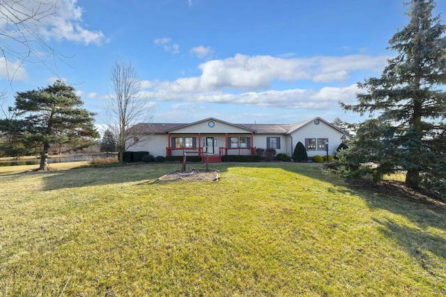 single story home featuring a front lawn