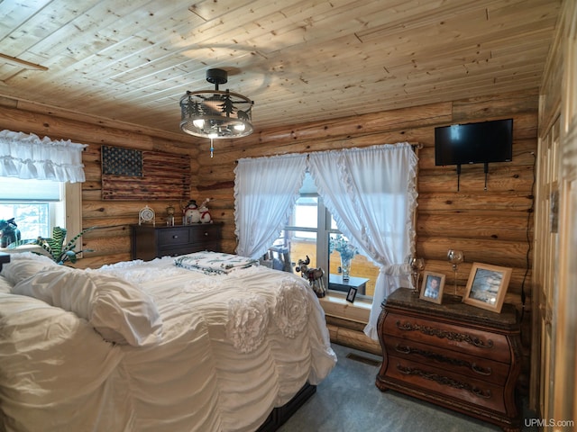 carpeted bedroom with wooden ceiling and visible vents