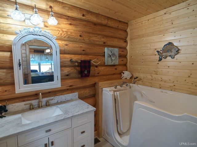 bathroom with wooden ceiling, vanity, and a bath