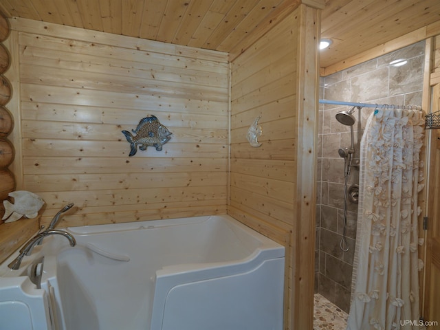 bathroom featuring a shower stall, a bath, and wood ceiling