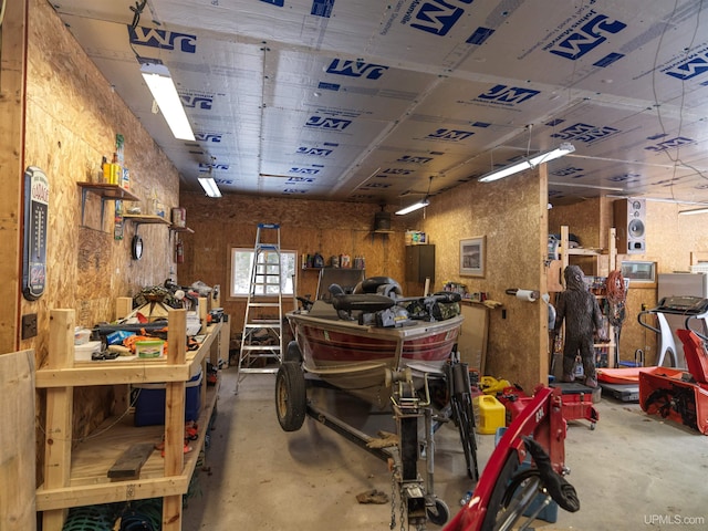 garage with a workshop area