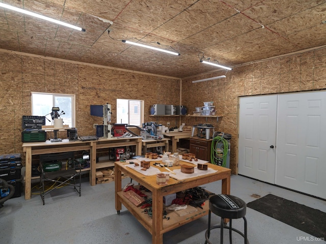 interior space featuring a workshop area