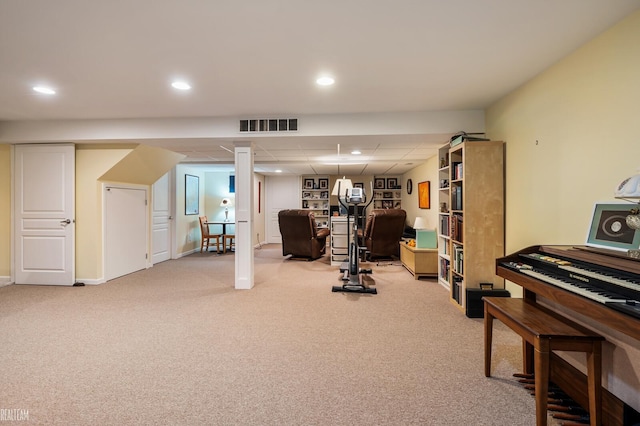 exercise room featuring visible vents, recessed lighting, and carpet floors