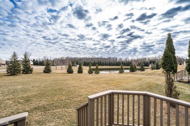 view of yard featuring a balcony