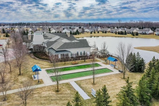 aerial view with a residential view and a water view