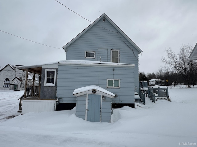 view of snow covered property