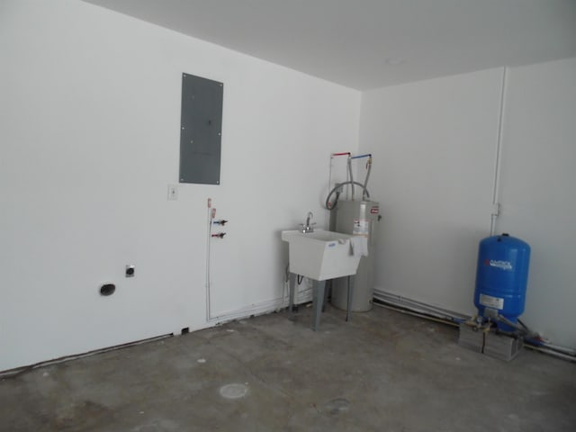 clothes washing area with electric panel and electric water heater