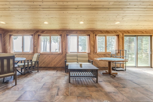 interior space with wooden ceiling and plenty of natural light