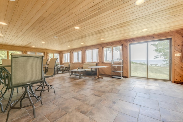 interior space with recessed lighting, wood walls, and wooden ceiling