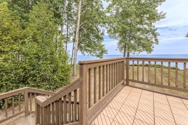 deck featuring a water view