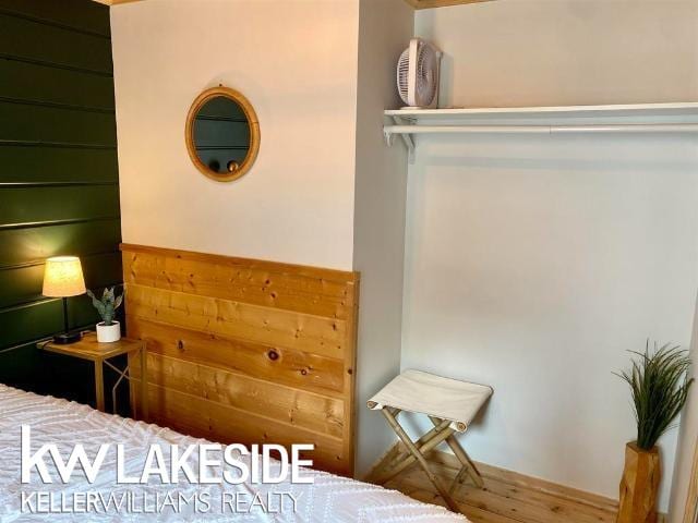 bedroom featuring wood finished floors