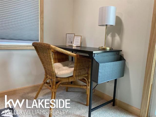 office area featuring baseboards