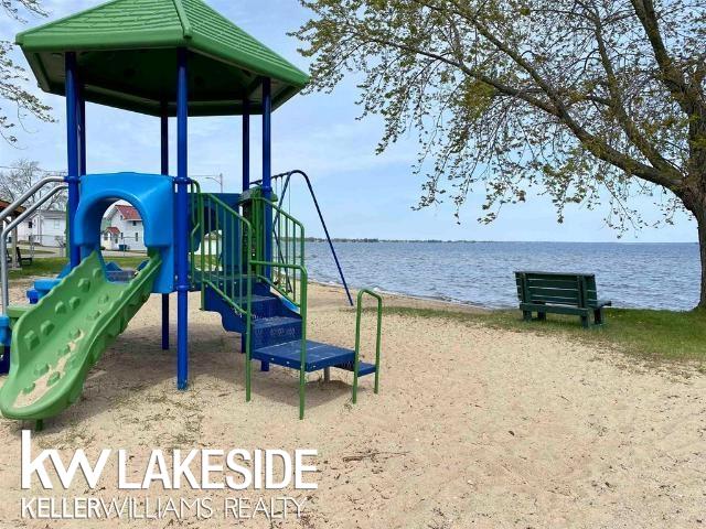 community play area with a water view