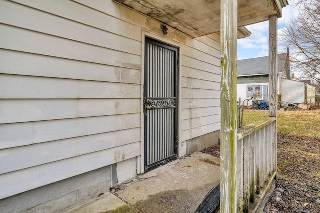 property entrance with fence